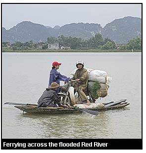 Ferrying across the flooded Red River